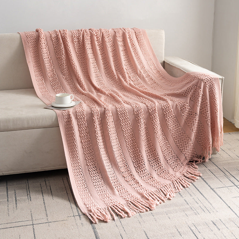 Knitted open-weave blanket