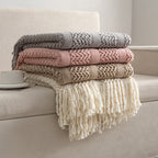 Knitted open-weave blanket