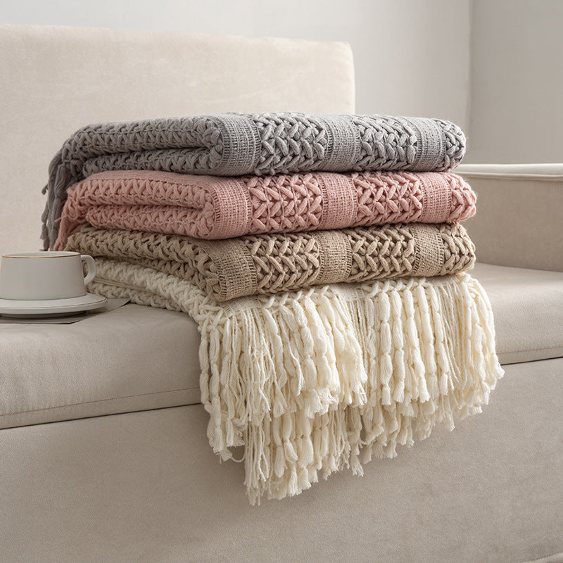 Knitted open-weave blanket