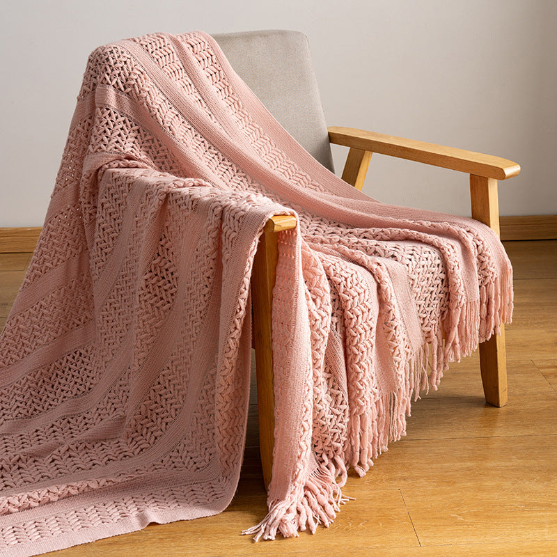 Knitted open-weave blanket