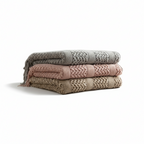 Knitted open-weave blanket