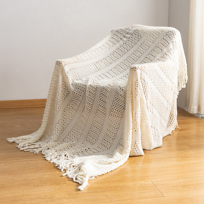 Knitted open-weave blanket