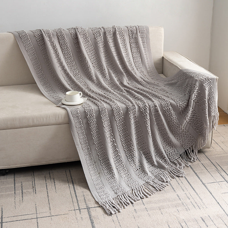 Knitted open-weave blanket