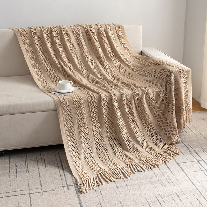 Knitted open-weave blanket